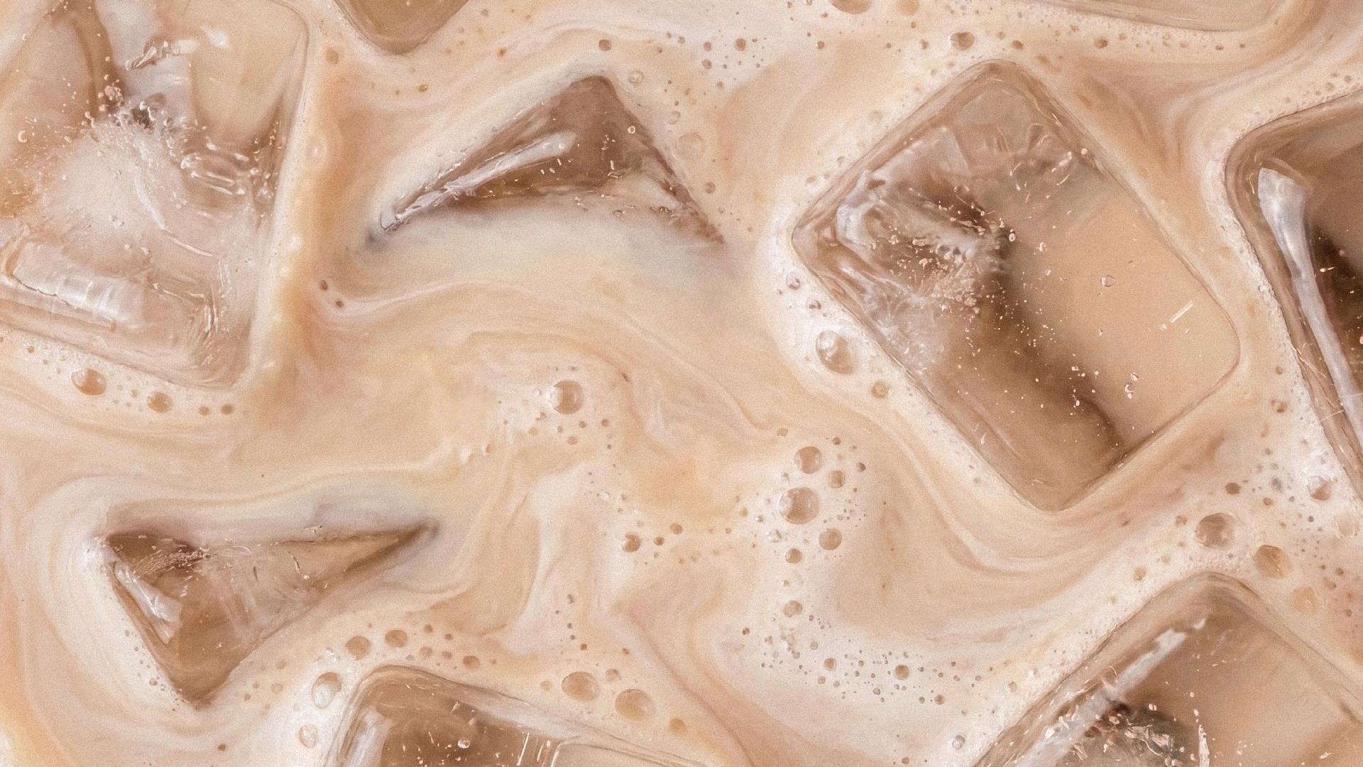 Cookie milk drink on an iced coffee background
